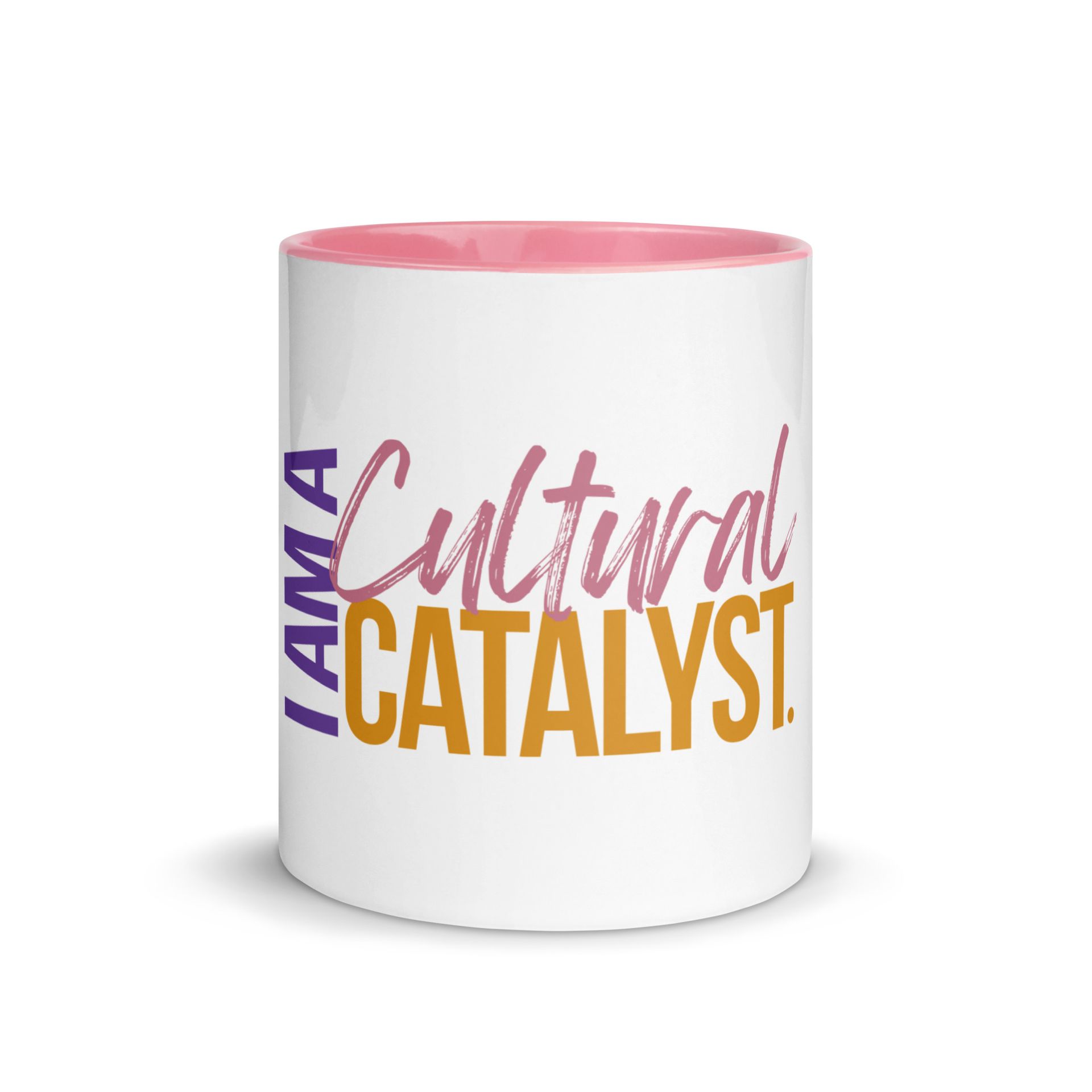 White mug with pink interior, reading “I AM A Cultural Catalyst” in purple, pink, and gold text
