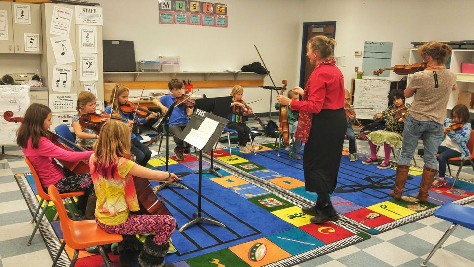 Art for All image of violin and cello practice