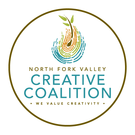 North Fork Valley Creative Coalition logo with colorful abstract leaf and circle design.