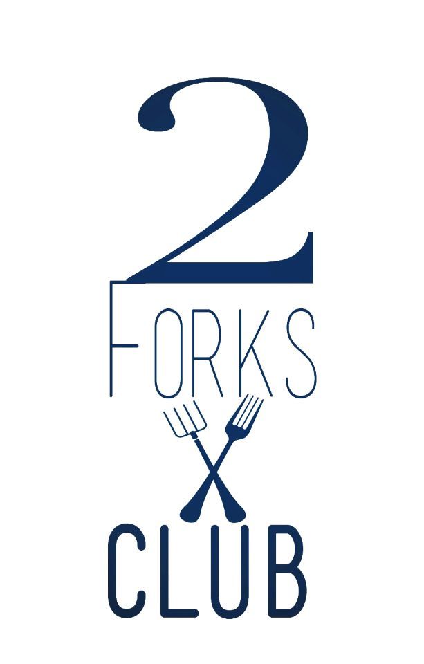 2 Forks Club logo with navy text and crossed forks on a white background