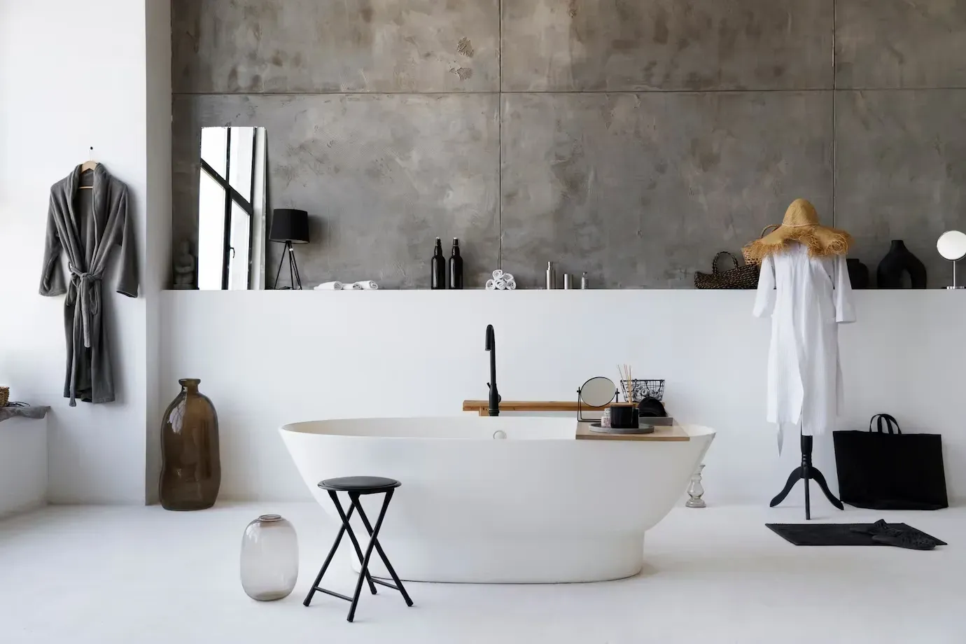 There is a bathtub in the middle of the bathroom.