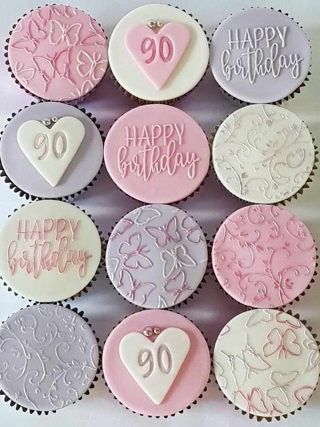 A bunch of cupcakes with the number 90 on them