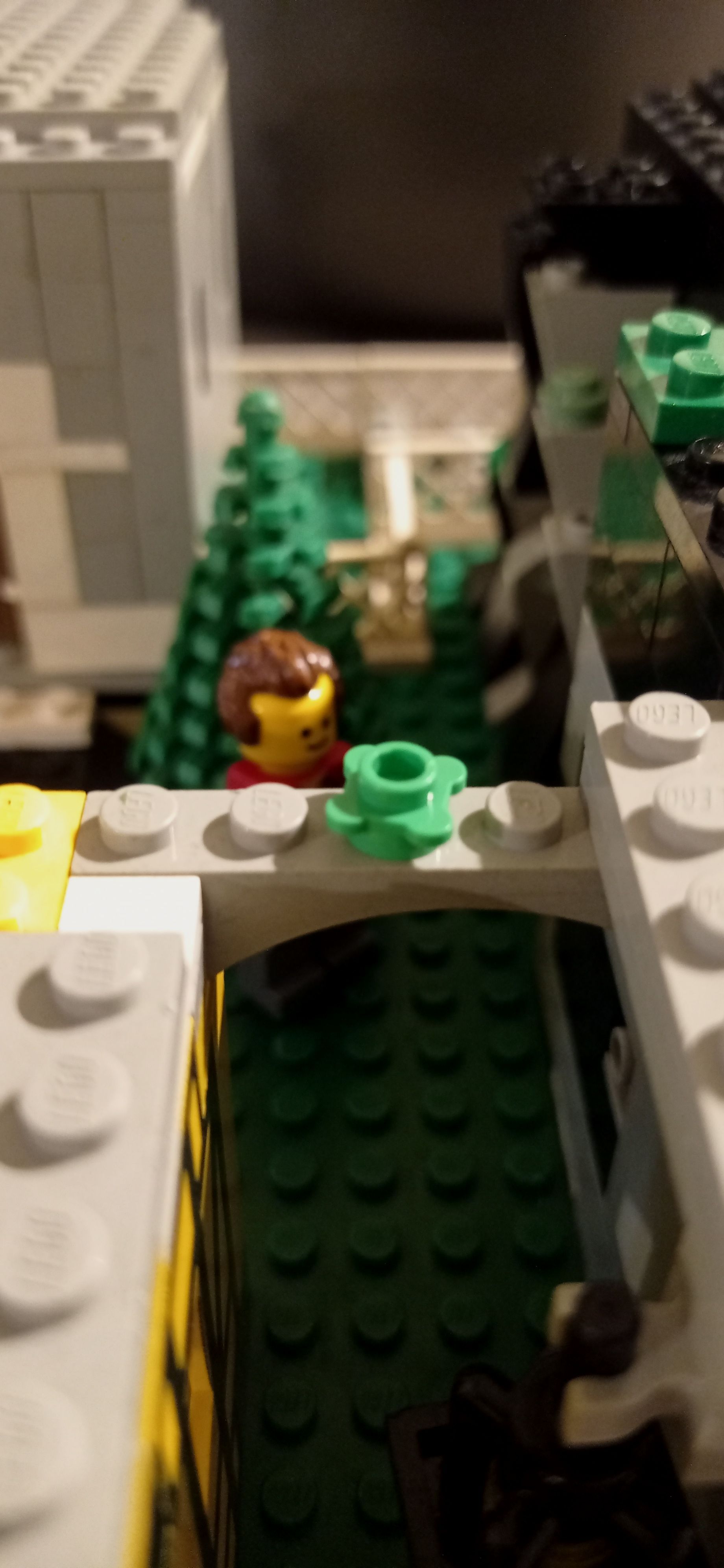 A close up of a lego model of a bridge.