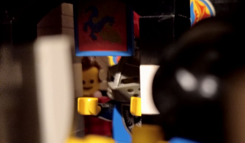 A close up of a lego figure in a room.