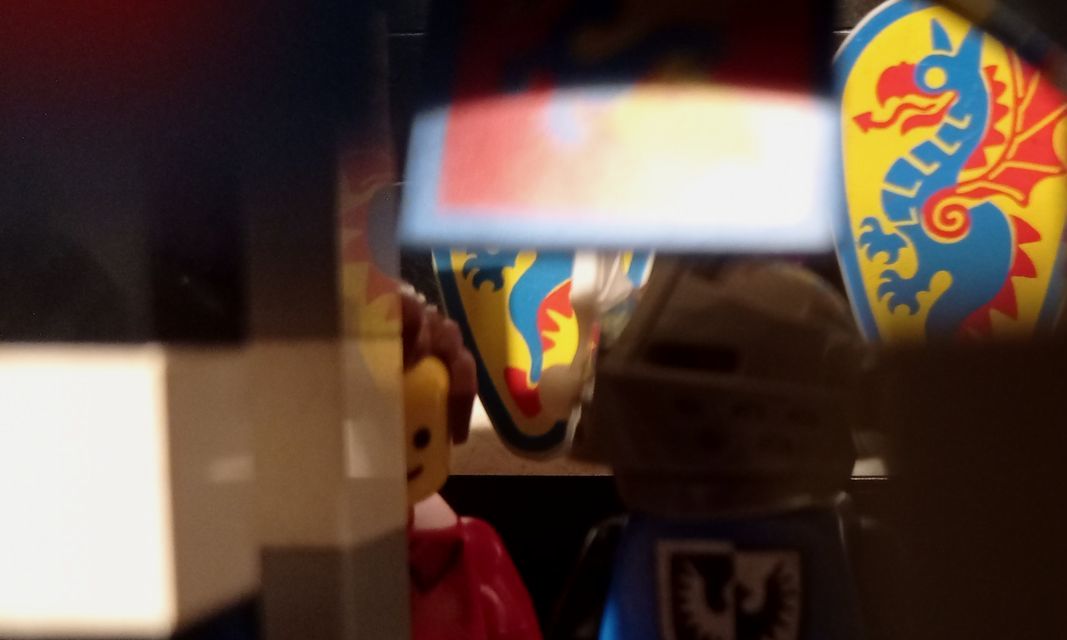 A close up of a lego knight with a shield