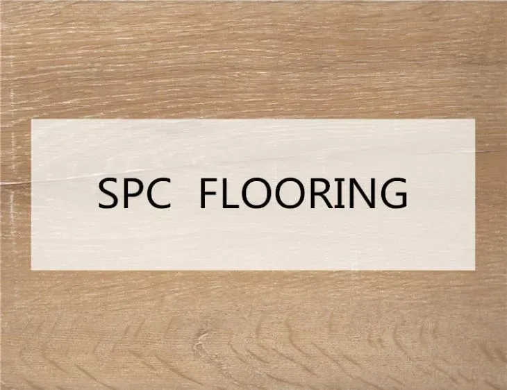 A piece of wood with the words spc flooring on it