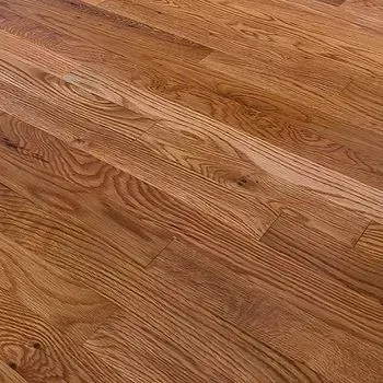 A close up of a wooden floor in a room.