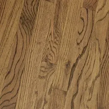 A close up of a wooden floor with a grain pattern.