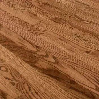 A close up of a wooden floor in a room.