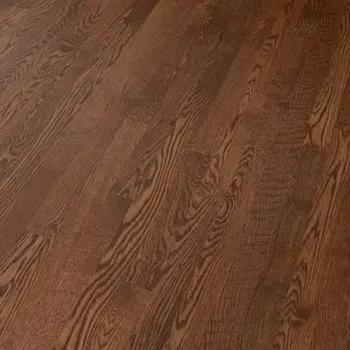 A close up of a wooden floor in a room.