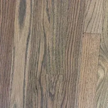 A close up of a wooden floor with a grain and texture.