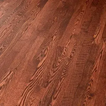 A close up of a wooden floor with a grain pattern.