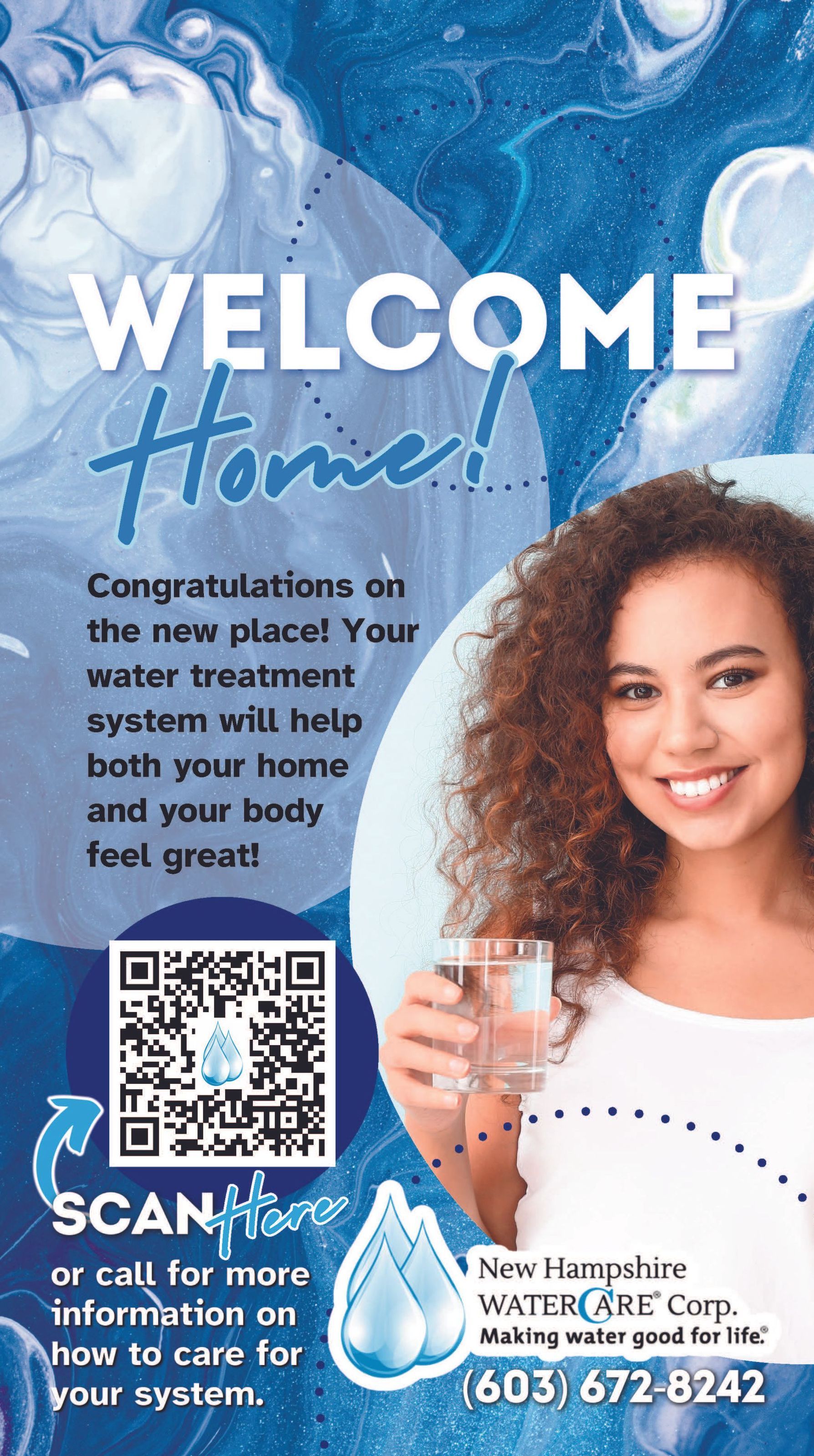 A woman is holding a glass of water in her hand.