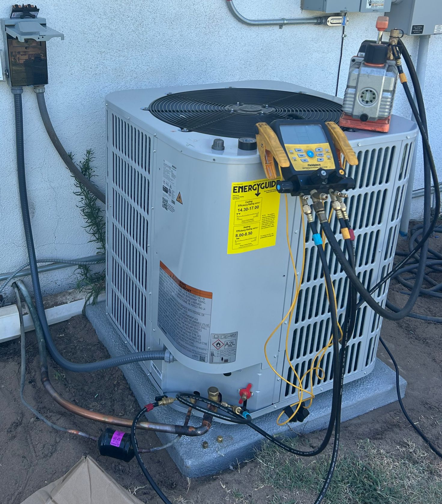 Two Air Conditioners Outside the House