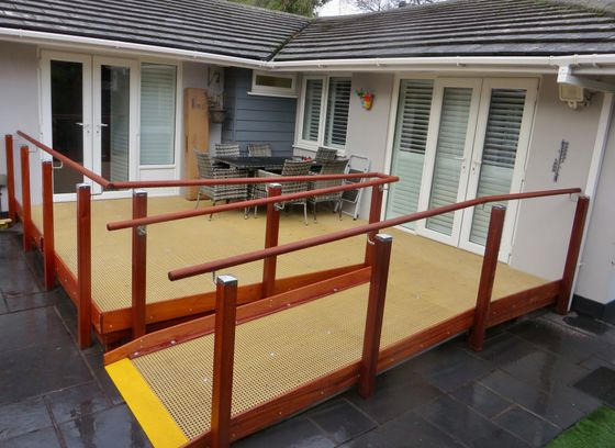 Handmade Wheelchair Ramps by Lymington Ramps .Access ramp system with large decking area by Lymington Ramps