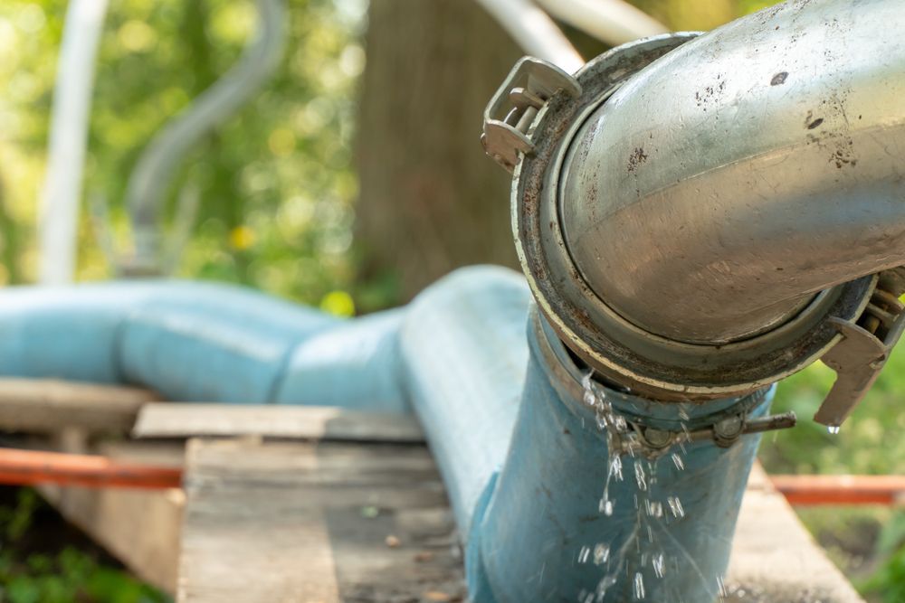 A Close Up of a Water Pipe With Water Coming Out of It — J & N Plumbing Pty Ltd In Tamworth, NSW
