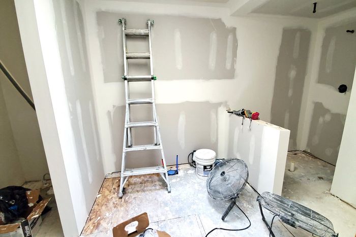 New Drywall Being Dried with Fans — Commerce, CA — IVO Wall Experts Inc.