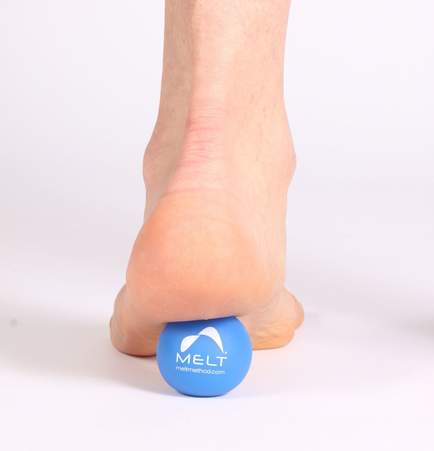 The MELT method foot treatment using a soft ball. Optimise Massage Therapies - Bonner, Gungahlin.