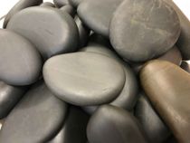 Basalt Stones used during a hot stone treatment at Optimise Massage Therapies - Bonner, Gungahlin.