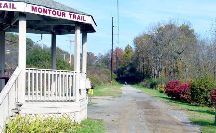 A gazebo with a sign that says montour trail on it