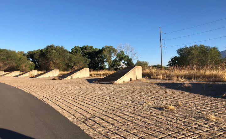 A row of concrete ramps on the side of a road.
