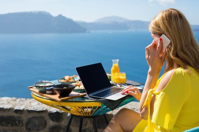A photo of a lady on the phone representing that we service Cairns, Adelaide, Queensland, Victoria, New South Wales, Northern Territory, South Australia and Western Australia for all our web design, seo, lead generation & small business growth services.