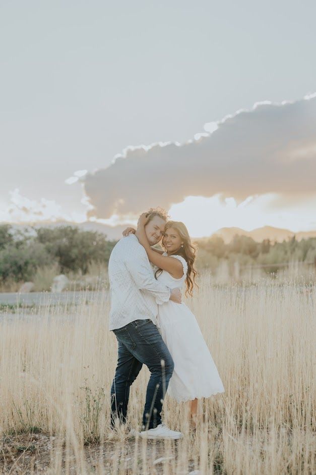 image of the creator of The Smart Packer with his wife standing in a field at sunset