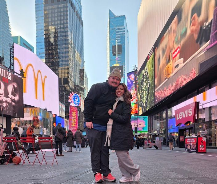 image of the creator of The Smart Packer with his wife on a trip to times square in NYC 