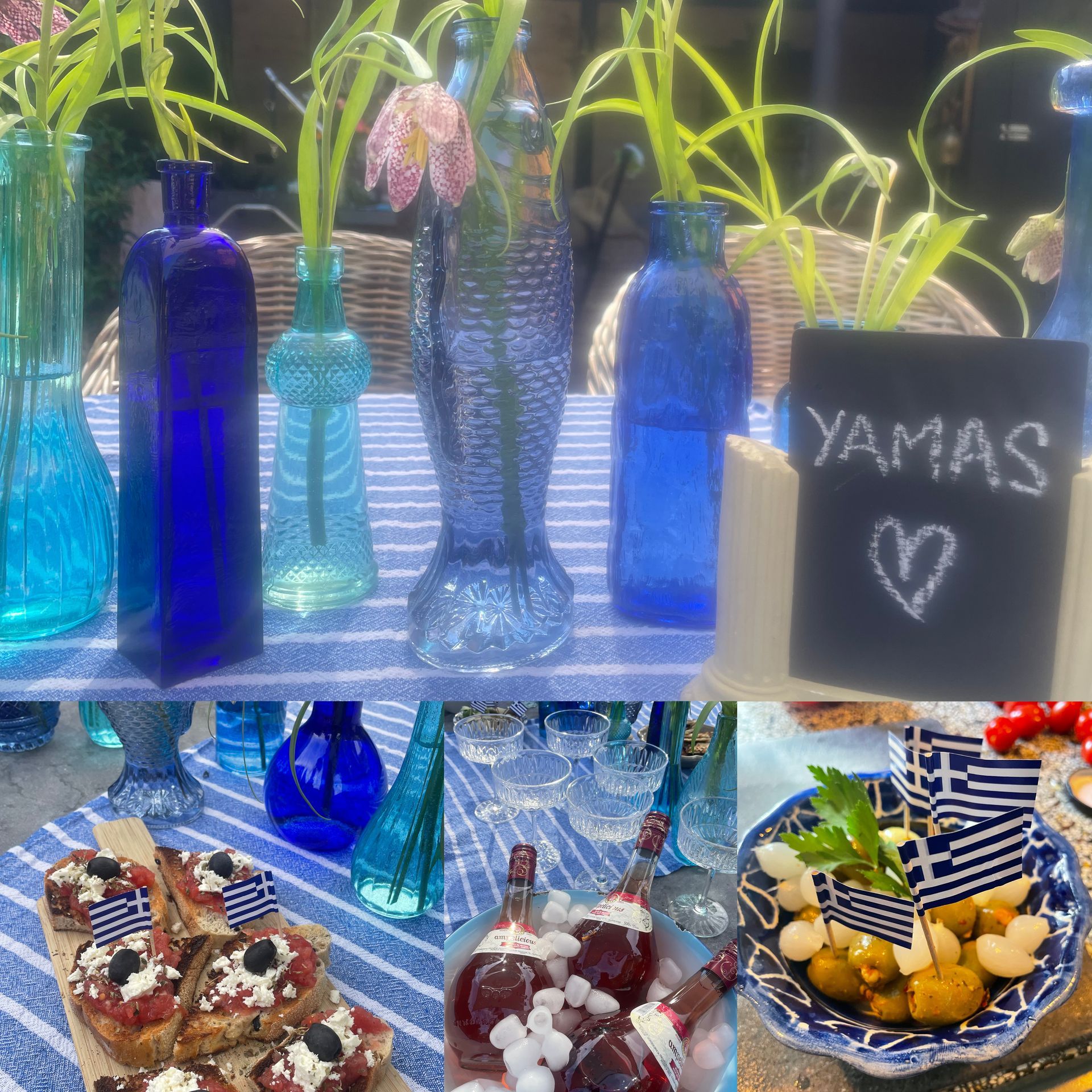 Tafel gedekt met blauwe glazen flessen, bloemen, hapjes en een krijtbord met de tekst Yamas