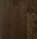 Un gros plan d'un plancher en bois marron.