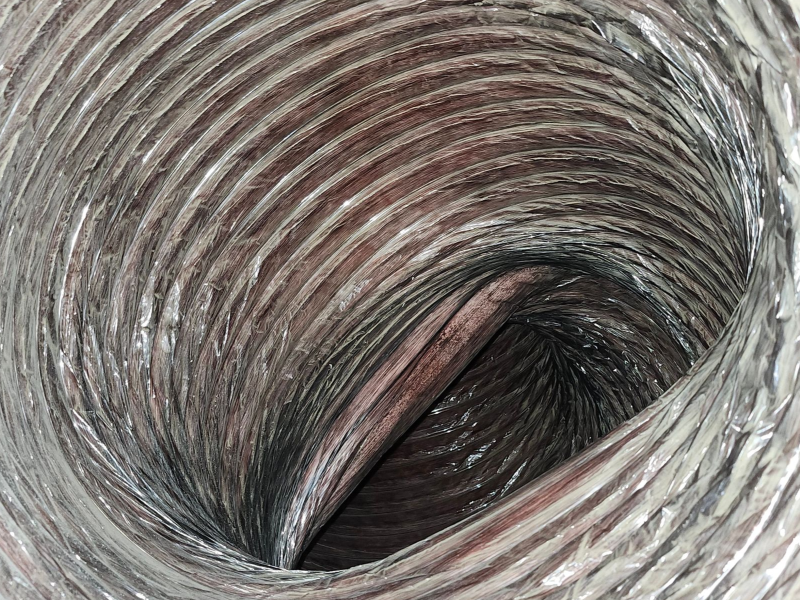 An inside view of poor duct routing sharp home solutions looking inside return duct that has been reduced in size becuase of poor routing, causing high static pressure