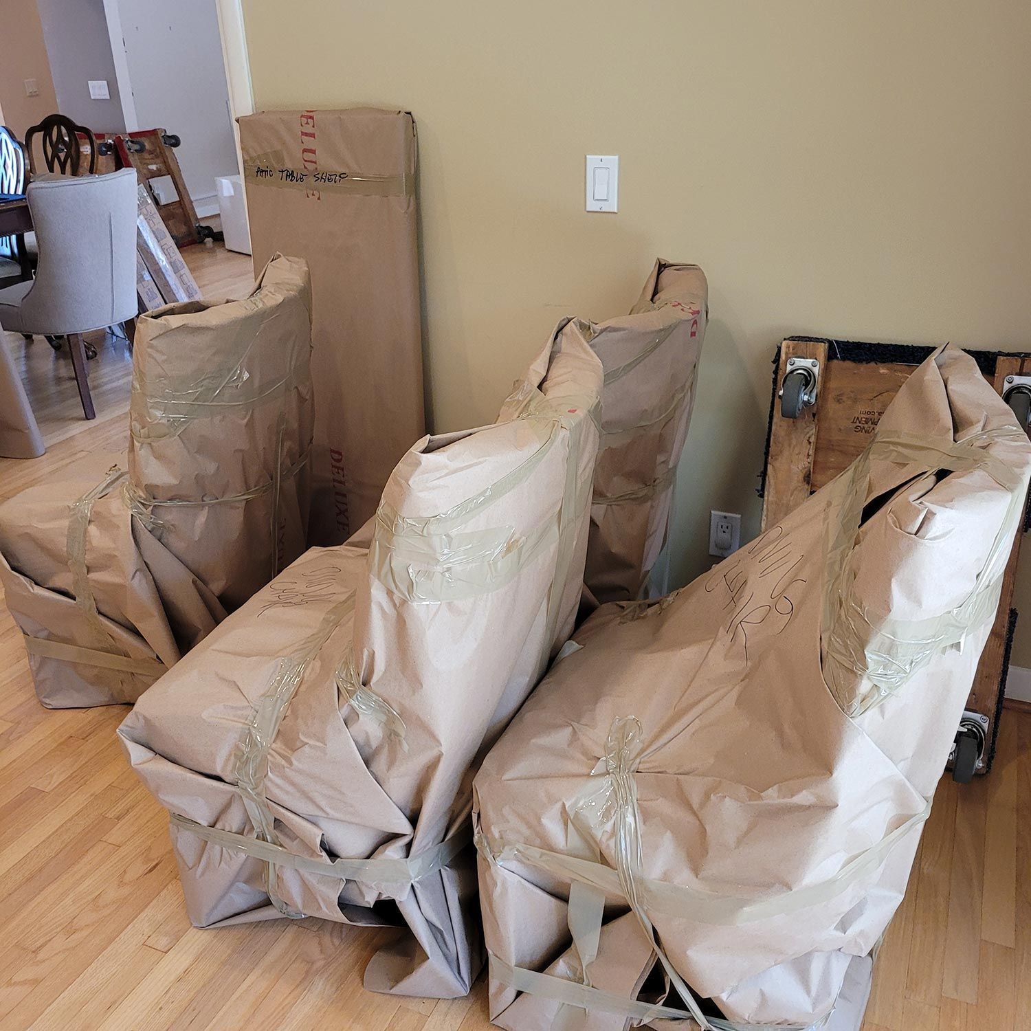 Wrapped chairs in a living room