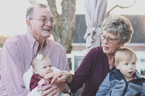 Senior couple with their grandchildren