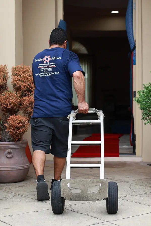 Moving worker with two-wheeled cart