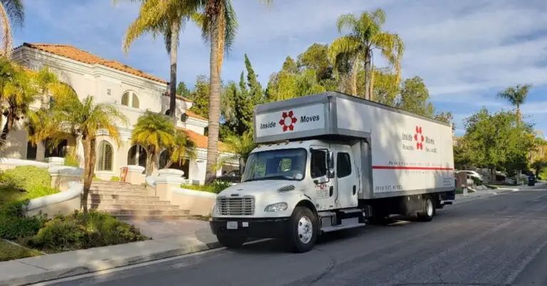 Moving truck parked on residential street