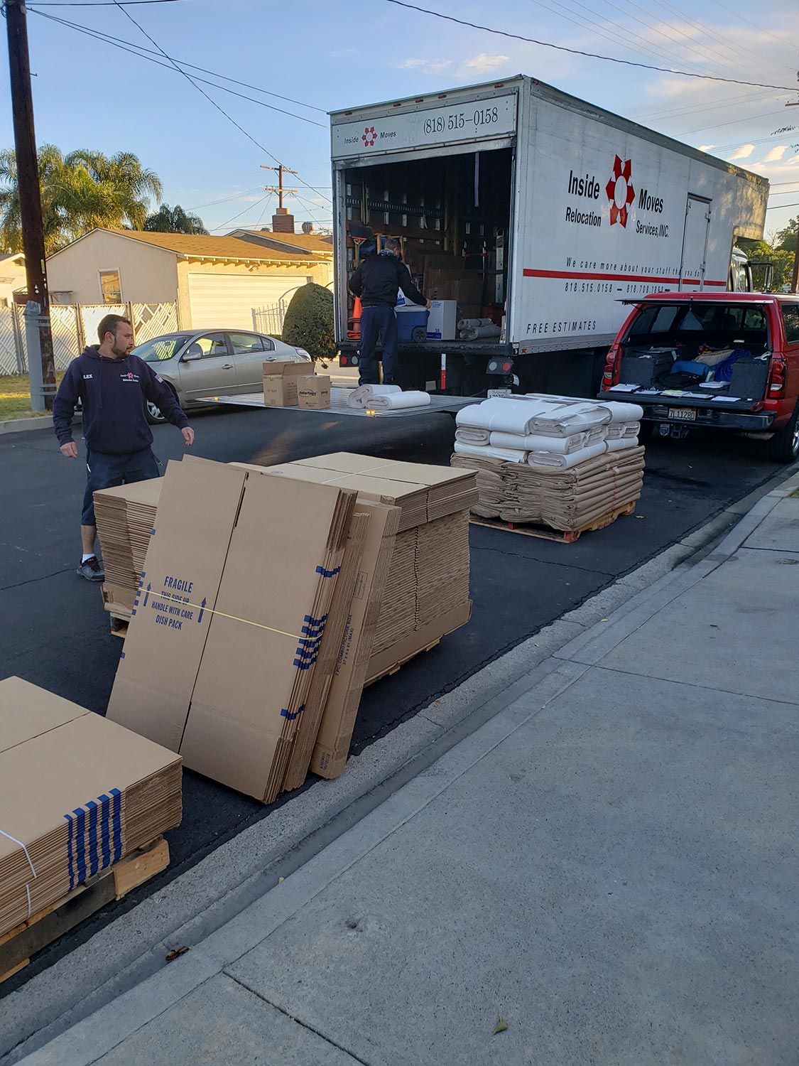 Moving truck with boxes unloading the boxes