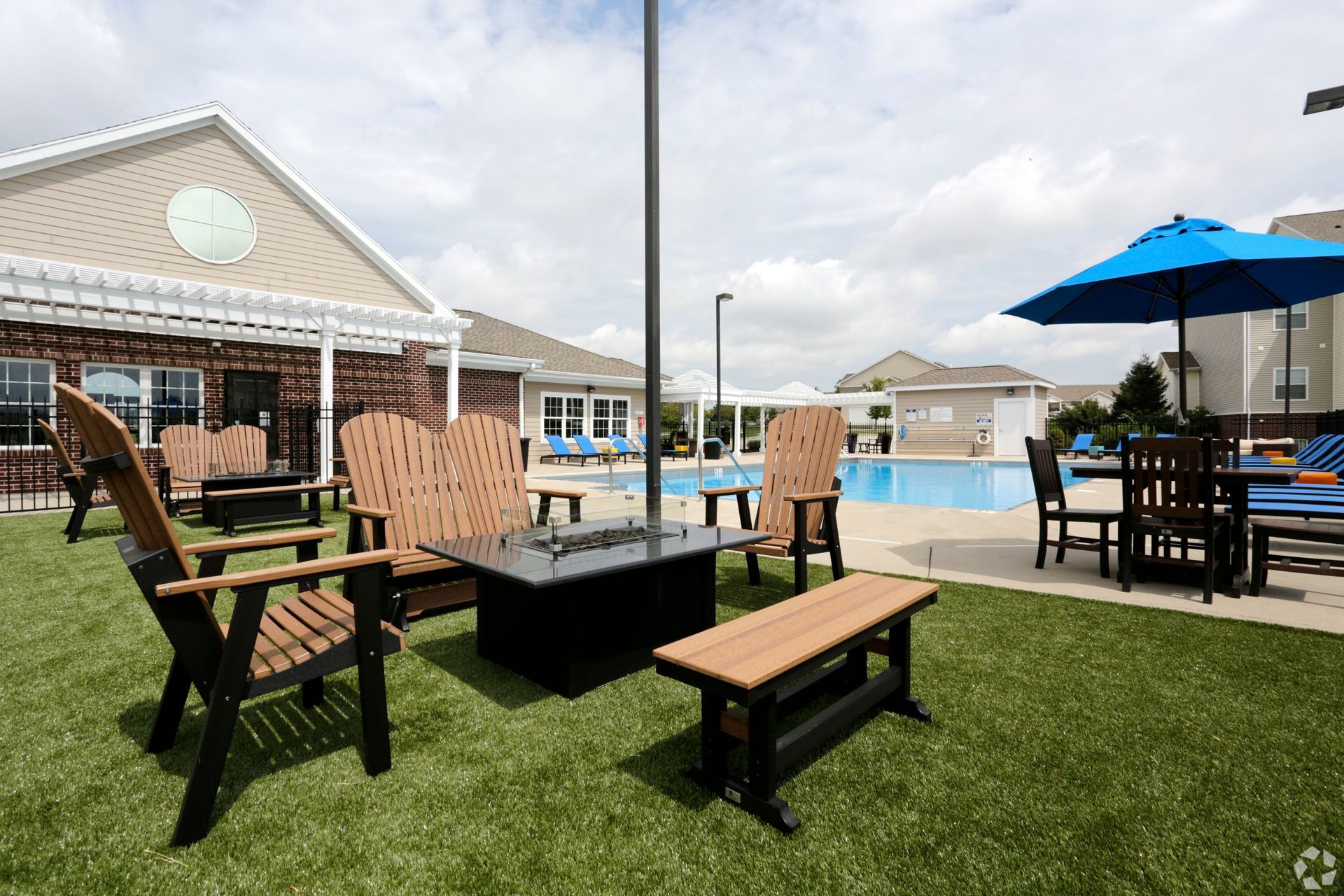Windsor West - swimming pool with lounge chairs