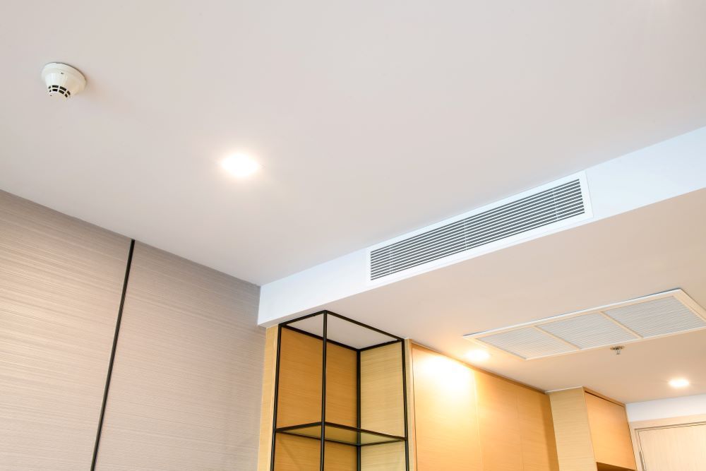 A Room with A Ceiling Fan and A Smoke Detector on It — Gympie Air-Conditioning & Refrigeration In Southside, QLD
