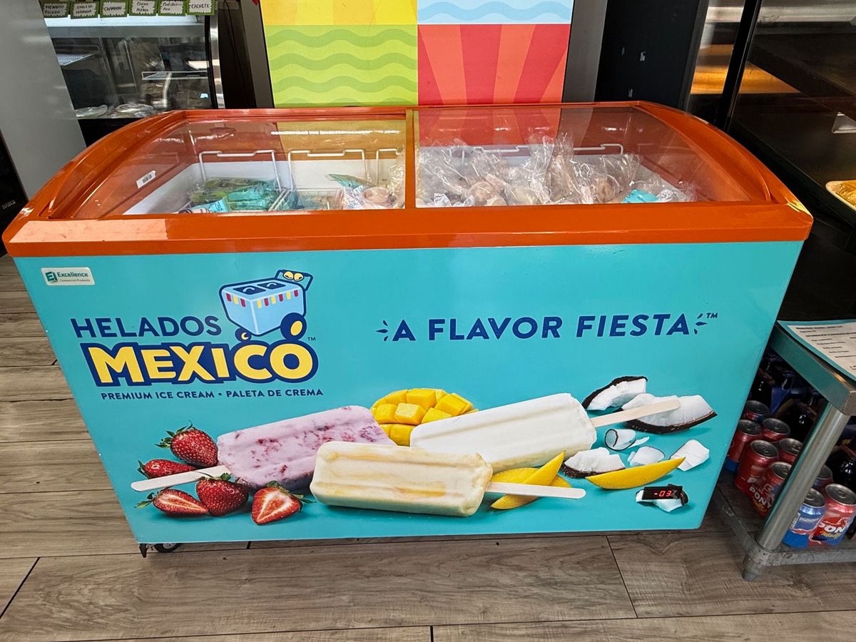 Helados México freezer full of ice cream bars at Mini Market Mundo Latino
