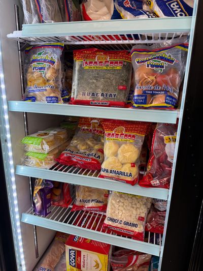 Latin groceries and pantry staples on the shelves at Mini Market Mundo Latino, photo 4