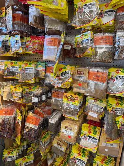 Latin groceries and pantry staples on the shelves at Mini Market Mundo Latino, photo 5