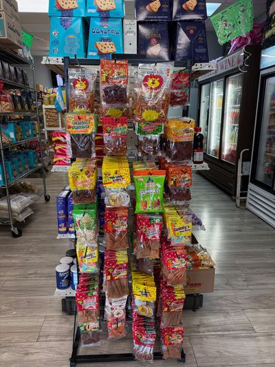 Latin groceries and pantry staples on the shelves at Mini Market Mundo Latino, photo 9