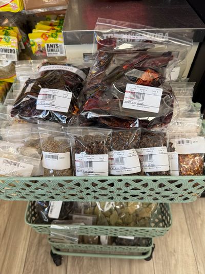 Latin groceries and pantry staples on the shelves at Mini Market Mundo Latino, photo 6