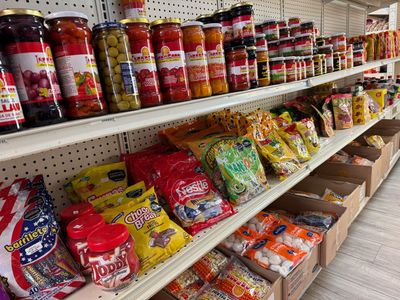 Latin pantry staples, sauces and candy on the grocery shelves in Avon