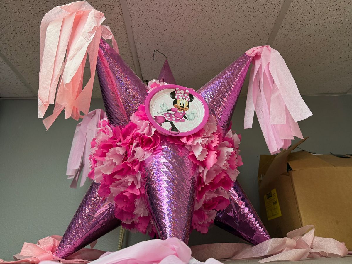 Pink star piñata for sale at Mini Market Mundo Latino in Avon