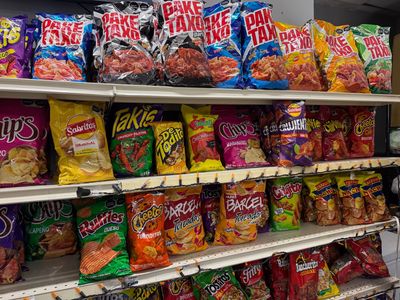 Latin groceries and pantry staples on the shelves at Mini Market Mundo Latino, photo 2
