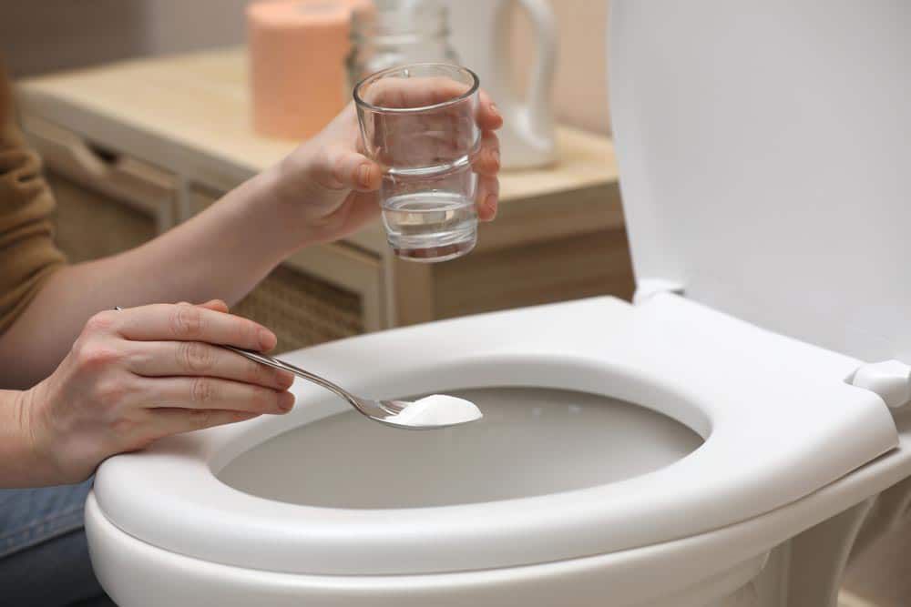Adding Vinegar And Soda To Toilet — Solahart In Goonellabah, NSW