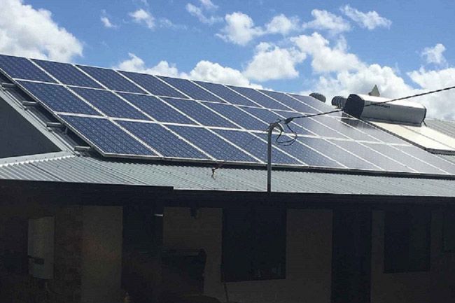 There Are Many Solar Panels On The Roof Of A House — Solahart In Goonellabah, NSW
