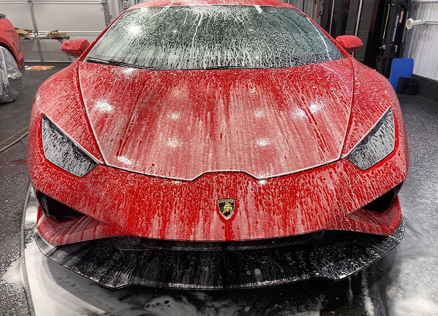 washing luxury car with paint protection film