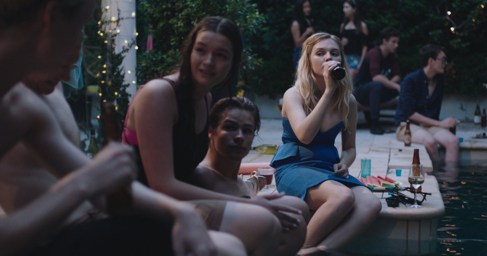 Teenagers drinking by a pool, from Tangles and Knots